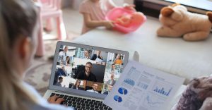 Woman looking at computer screen during virtual meeting