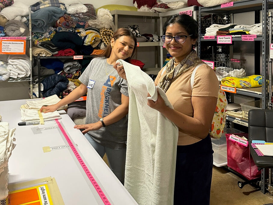 Evie Chhetry (L) from the University of Maryland and Nabila Nishat Raisa (R) from American University volunteering at A Wider Circle.