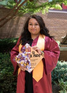 Graduate with decorated mortarboard